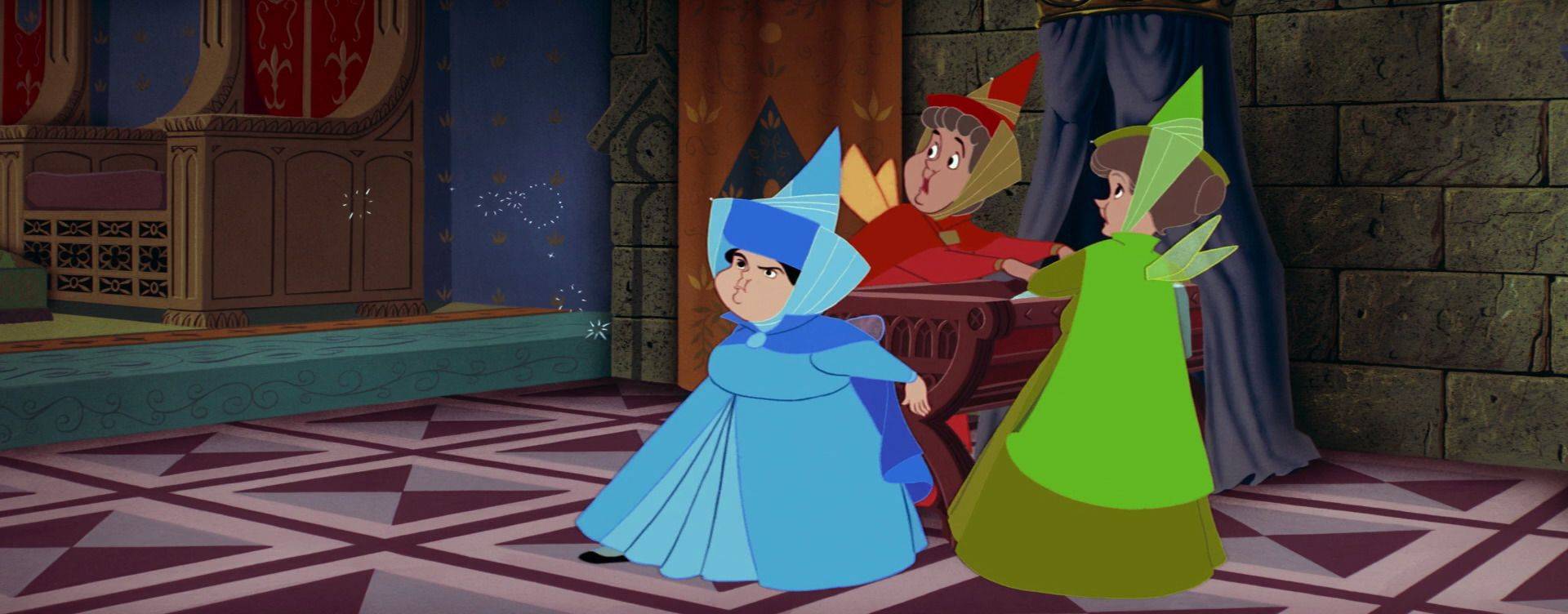 Le tre fate del cartone proteggono la piccola principessa nella culla.
